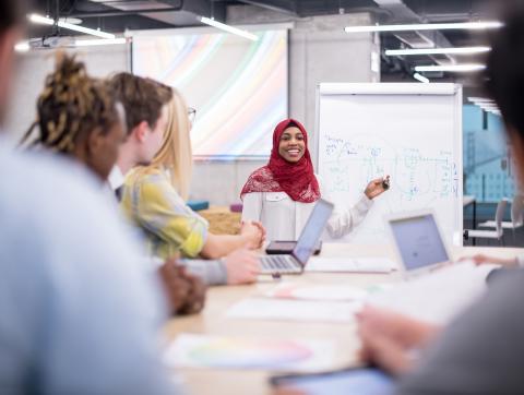 Female professor instructing